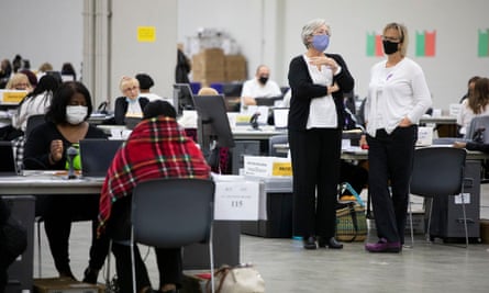 Michigan election workers pre-sort ballots ahead of Tuesday’s midterm elections in Detroit, Michigan. Democrats have a chance to flip the senate chamber in Michigan.