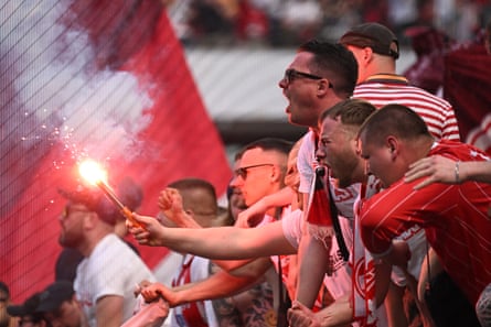 Köln fans celebrate after the victory over Union Berlin.