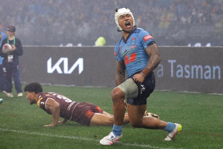 Brian To'o celebrates a try during Game 2.