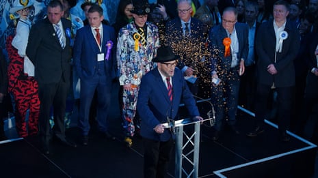 George Galloway heckled on climate during Rochdale victory speech – video