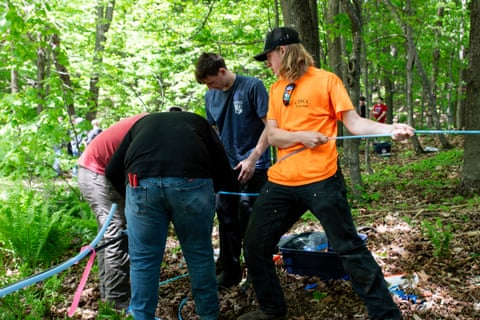 With tools as seemingly simple as these blue tubes, it’s easier than ever to extract sap from maple trees, as these young people demonstrated during a May Future Farmers of America convention on 20 May.
