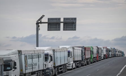 A queue of grain transporting trucks waiting to enter the terminals at Constanța harbour in Romania.