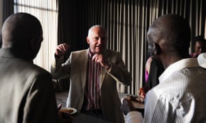 Laureus ambassador John Robbie chats with graduates of the Laureus YES programme in Johannesburg in 2014.