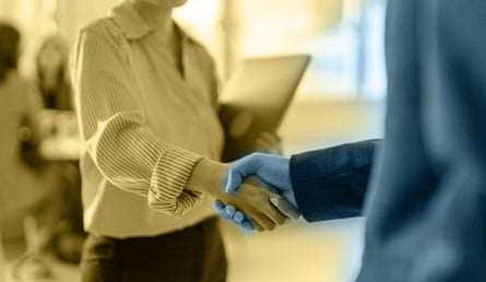 Two people shaking hands