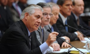 Rex Tillerson, at left, at an energy committee hearing in Washington, June 2010