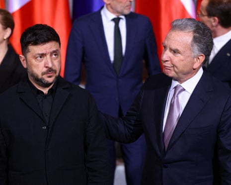 Ukraine's president Volodymyr Zelensky and US special envoy Steve Witkoff gather for a family photo at the Chancellery in Berlin.