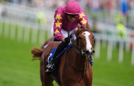 Thundering On, ridden by jockey Dylan Browne McMonagle, on the way to winning the Betfred Oaks at Epsom.