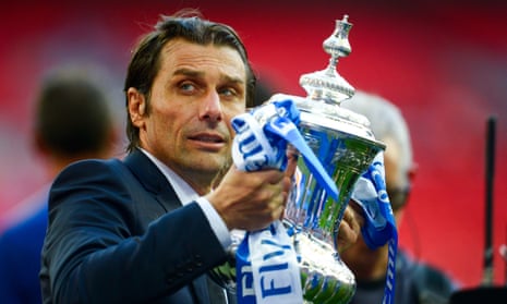 Antonio Conte lifts the FA Cup after Saturday’s victory