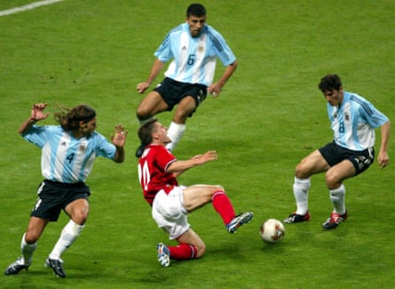 Michael Owen is fouled successful nan container by Mauricio Pochettino (left) successful Japan successful 2002.