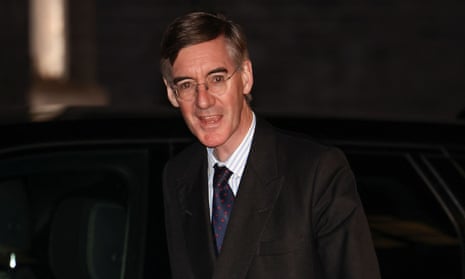Business secretary Jacob Rees-Mogg arrives at 10 Downing Street in London.