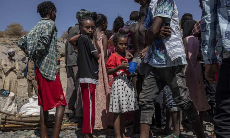 Tigrayans who have fled the fighting arrive in Hamdayet, eastern Sudan, near the border with Ethiopia, on Saturday.