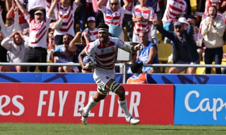 Amato Fakatava of Japan sprints down the wing to register one of the tries of the tournament against Argentina.