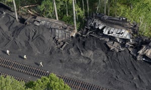 A derailed coal train