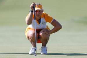 Emily Kristine Pedersen of Team Europe lines up a putt.