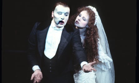 Michael Crawford in the title role and Sarah Brightman as Christine Daaé in the London production of The Phantom of the Opera, 1986, directed by Hal Prince.