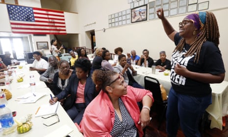 LaTosha Brown, co-founder of Black Voters Matter, leads an organizing song at a meeting of several grassroots organizations in Greenville, Mississippi, August 2018.
