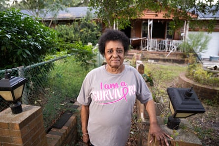 Margaret Alston outside her storm-damaged home in Bucksport, South Carolina. Alston has not been able to access the necessary federal and private funds to repair the house because her name is not on the deed.