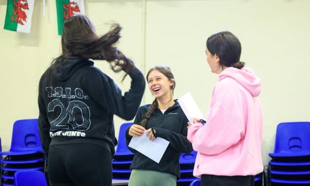 Students at Ysgol Syr Hugh Owen celebrate their results.