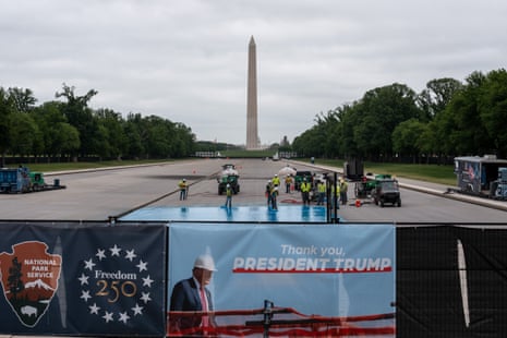 Crews sprayed a blue coating on the Lincoln Memorial Reflecting Pool on 25 April, in front on a banner created by the Trump administration thanking Donald Trump.