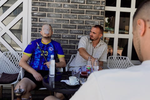 Anes Hadžić, a Bosniak in the majority-Croat town of Kiseljak, with friends at a hookah lounge.