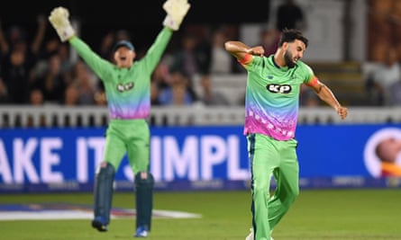 Saqib Mahmood and Sam Billings celebrate the wicket of Kieron Pollard