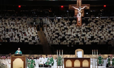 Pope Francis, left, celebrates mass at Madison Square Garden in New York.