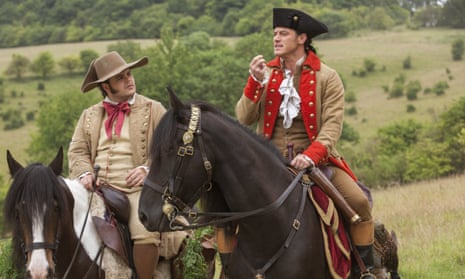 Josh Gad as LeFou, left, and Luke Evans as Gaston in Disney’s Beauty and the Beast. 