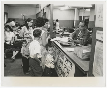 Cuban refugee family at the registration counter in 1962.