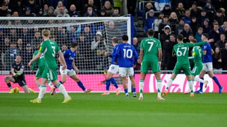 Newcastle United’s Lewis Miley (right) scores his side’s second goal at Everton.