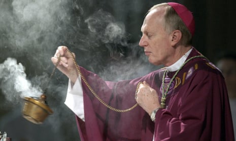 Bishop Howard Hubbard swinging incense during an Ash Wednesday communion service at the Cathedral of the Immaculate Conception in Albany, New York, in 2004. 