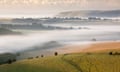 Early morning mist hanging over the South Downs near Ditchling Beacon.<br>EYY6CR Early morning mist hanging over the South Downs near Ditchling Beacon.