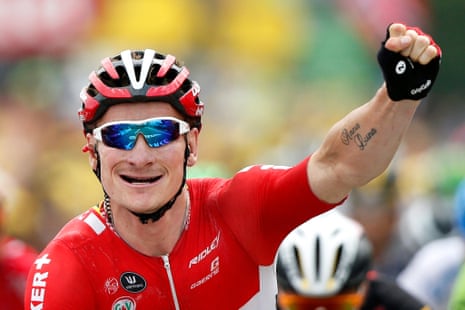 Andre Greipel celebrates after crossing the finish line.