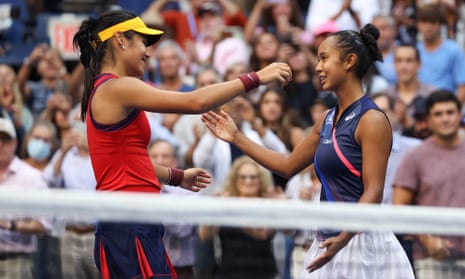 Emma Raducanu and Leylah Annie Fernandez embrace after Raducanu’s win.