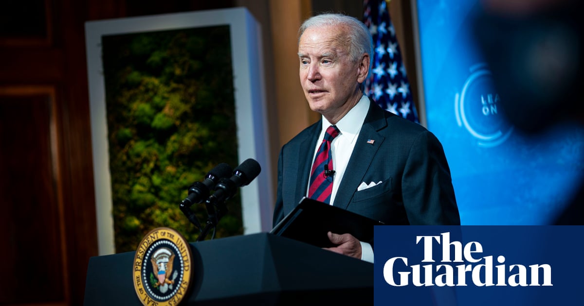 Biden vows to slash US emissions by half to meet ‘existential crisis of our time’ - The Guardian