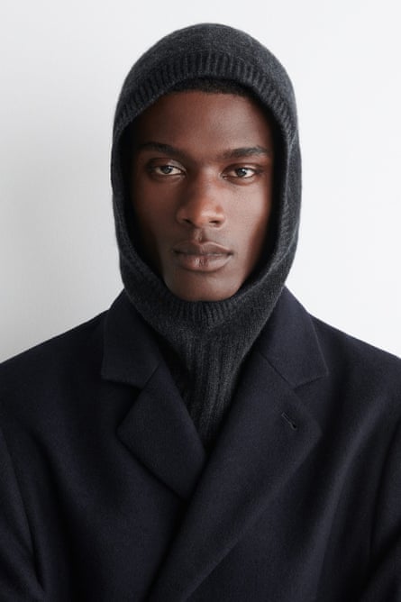 A model wearing a grey balaclava