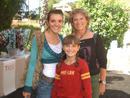 A young Stoner with their sister, Correy (left) and mother, Lou Ann Hodge (right).