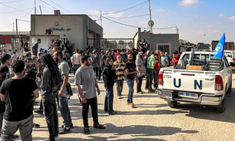 Men of different ages standing around the border