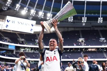 Porro hoists the Europa League trophy aloft at the Tottenham Hotspur Stadium