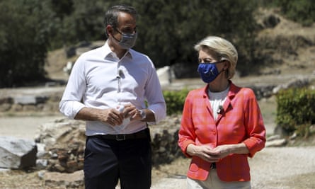 Kyriakos Mitsotakis and Ursula von der Leyen walk during their meeting at the ancient agora in Athens