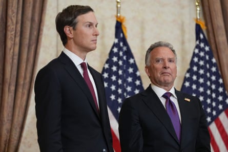Kushner (left) and Witkoff standing in front of US flags
