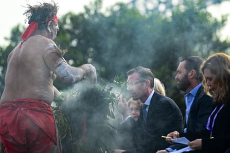 NSW premier Dominic Perrottett (centre) during the smoking ceremony.
