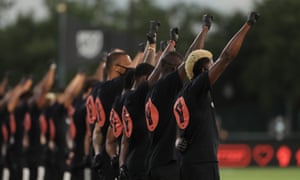 MLS teams participate in a Black Lives Matter pre-game ceremony before match between Orlando City and Inter Miami