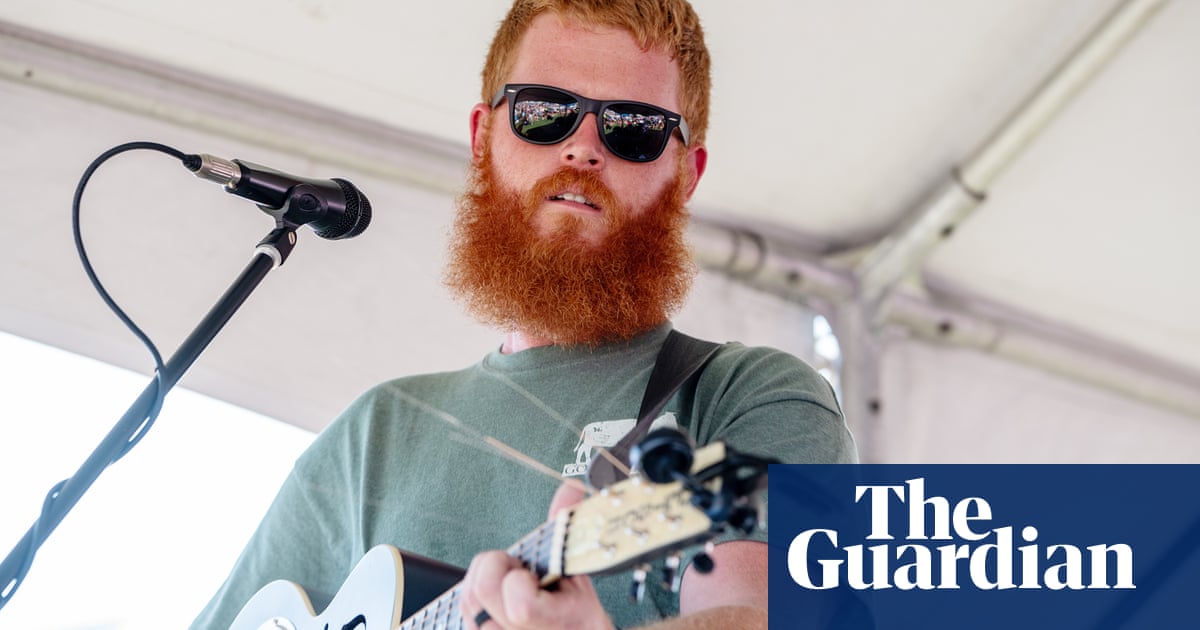 Controversial country song Rich Men North of Richmond makes US chart history – The Guardian