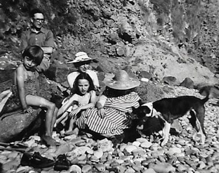 Caroline Westgate (centre) and Bill the dog with friends and family in 1950.