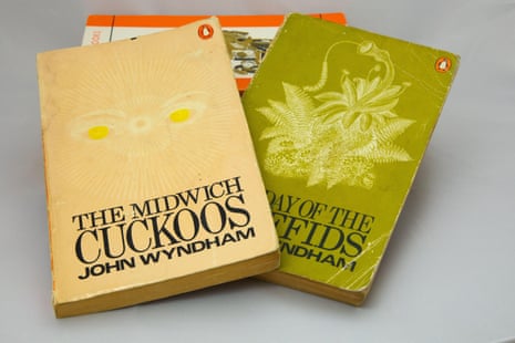 Paperback copies of John Wyndham`s novels The Midwich Cuckoos and The Day of the Triffids, published by Penguin