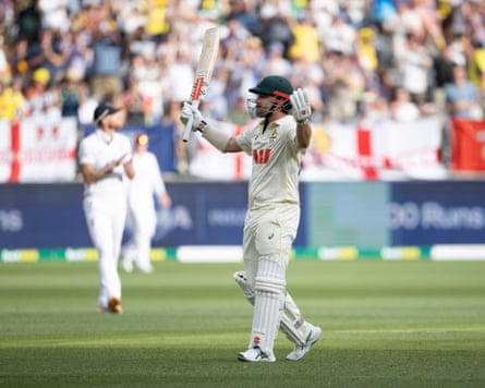 Travis Head celebrates reaching a century in the first Ashes Test at Perth Stadium