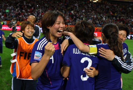 Saki Kumagai celebrates with Azusa Iwashimizu after scoring the winning penalty against USA to win the World Cup in 2011.