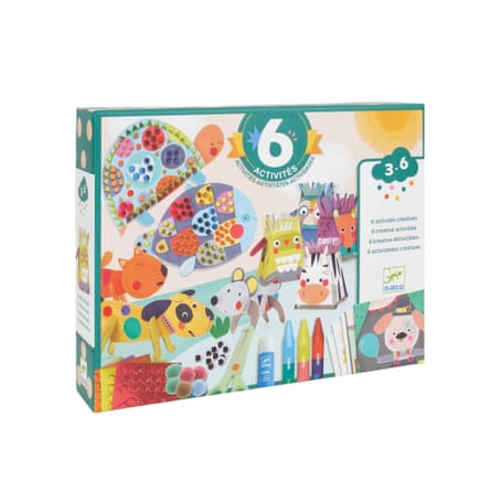 A childrenâÂÂs craft kit box shows colourful animal crafts, crayons, glue and scissors
