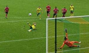 Teemu Pukki sends his penalty high and wide afte slipping.