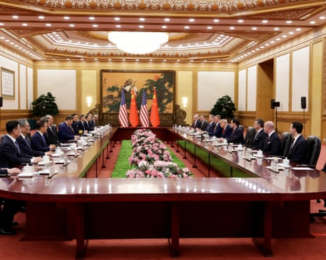Trump and Xi with their teams at the summit meeting in Beijing